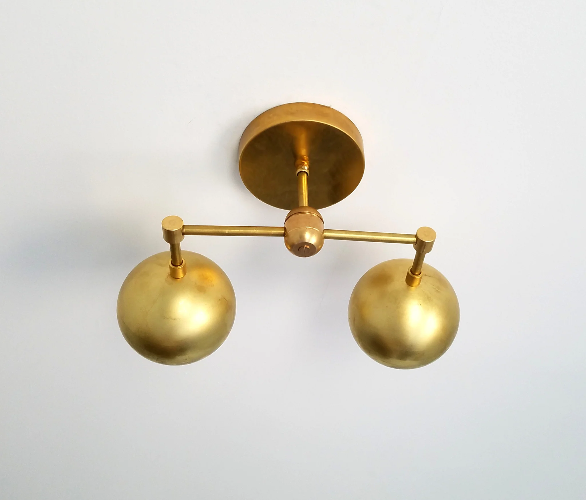 Double Loa Sconce in Raw Brass - Image 7